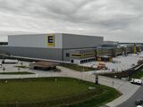 KfW IPEX-Bank and HELABA finance energy-efficient logistics conveyor technology for EDEKA Nord